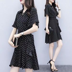 Black fashion dress with white dots